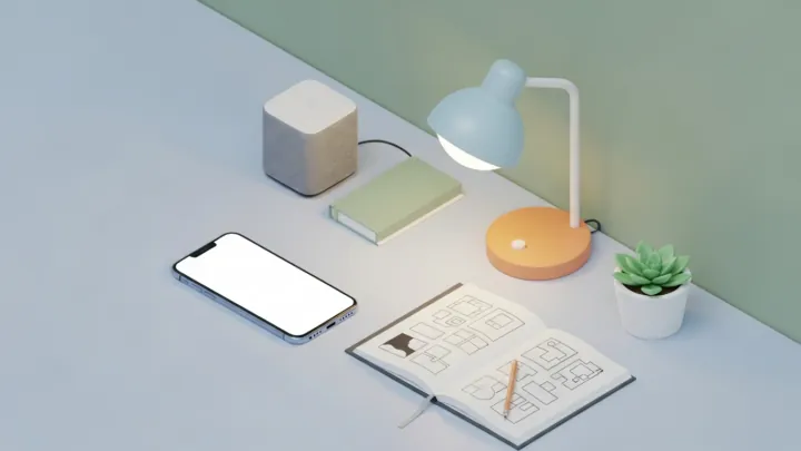 Smartphone on a cozy 3D-rendered desk with a lamp, potted plant, smart speaker and open notebook